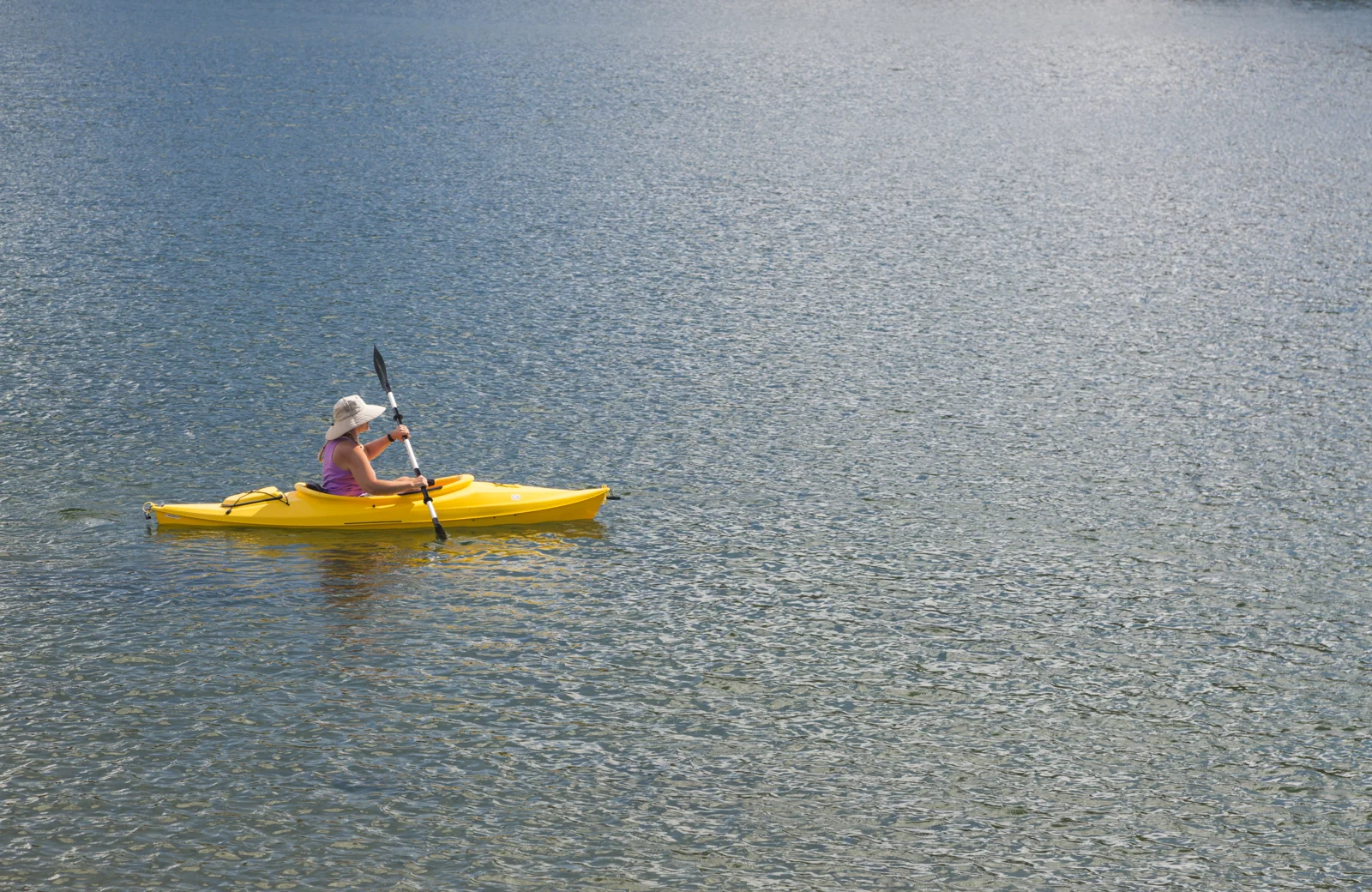 Woman Kayaking On Beautiful Peaceful Mountain Lake 2024 09 11 22 13 22 Utc